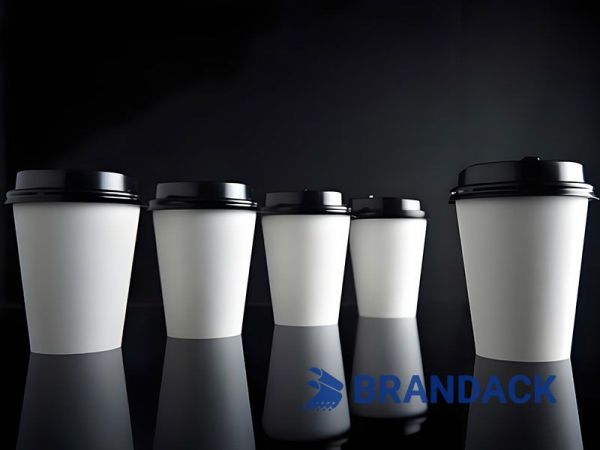 Sip & Impress: Your Brand, Elevated by Premium Custom Printed Coffee Cups Tired of generic coffee cups that get tossed and forgotten? Transform your everyday beverage vessel into a powerful, portable billboard and a tangible brand experience with BRANDACK's premium Custom Printed Paper To-Go Coffee Cups with Lids & Sleeves.