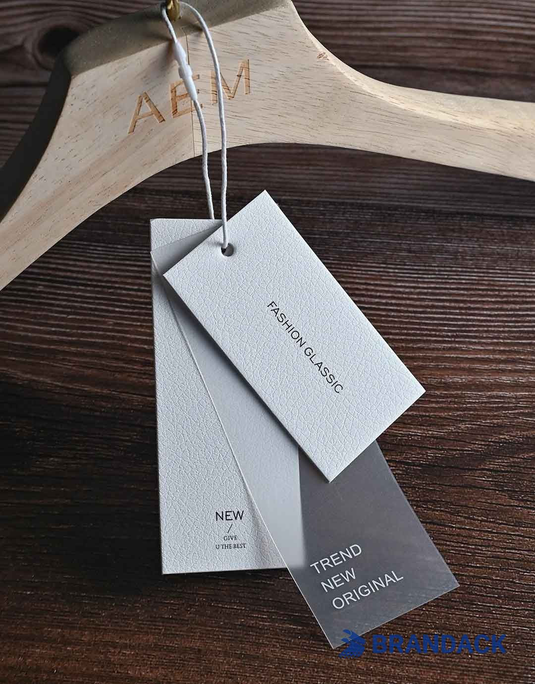 Custom Apparel Hang Price Tags | Bespoke Apparel Swing Tags with Logo Custom Apparel Hang Price Tags | Bespoke Apparel Swing Tags with Logo