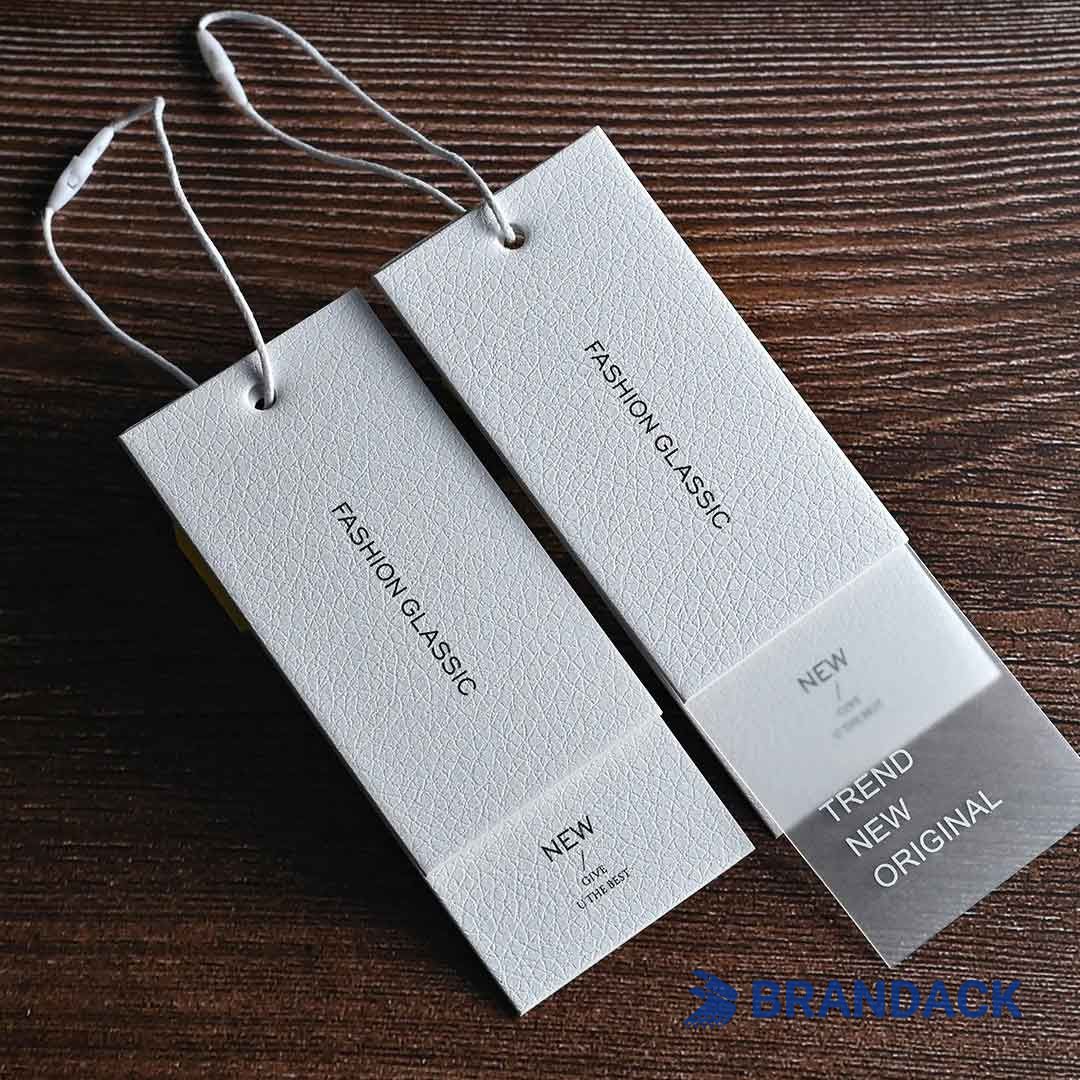 Custom Apparel Hang Price Tags | Bespoke Apparel Swing Tags with Logo Custom Apparel Hang Price Tags | Bespoke Apparel Swing Tags with Logo