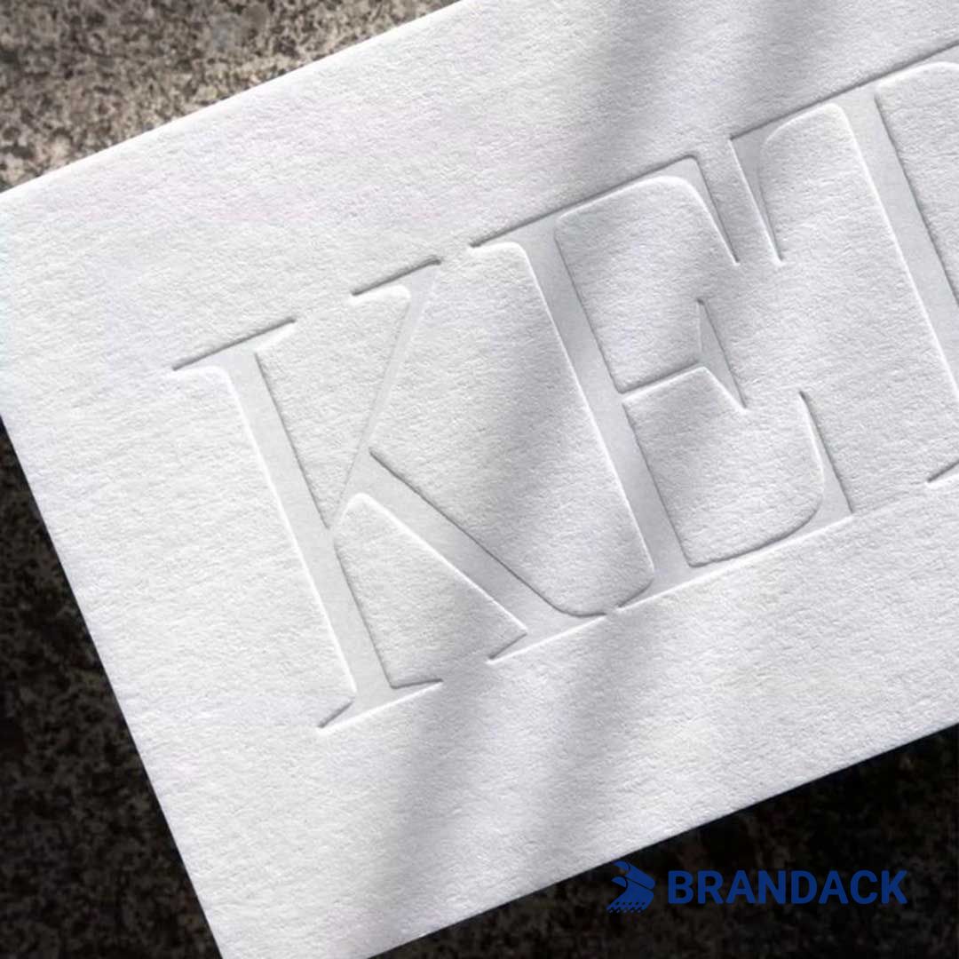 What are the commonly used packaging surface treatment processes?